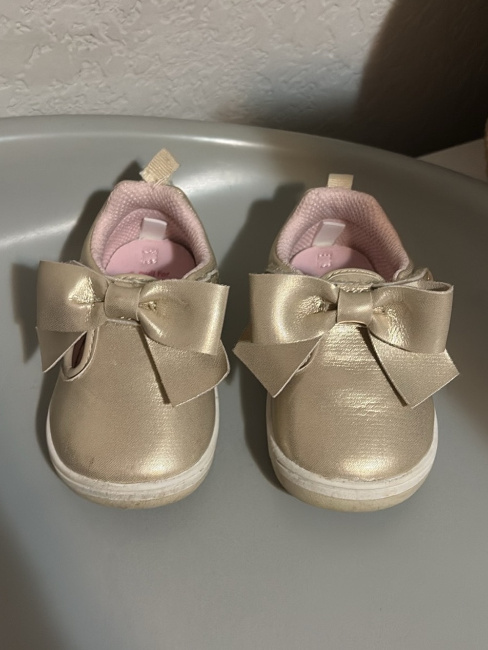 Stride Rite Metallic Gold Bow Sneakers with Pink Lining